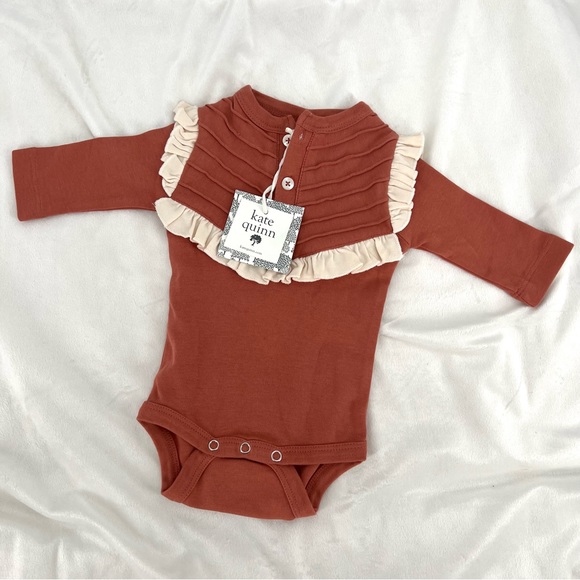 kate quinn One Pieces Kate Quinn Baby Girl Terracotta Ruffle Onesie